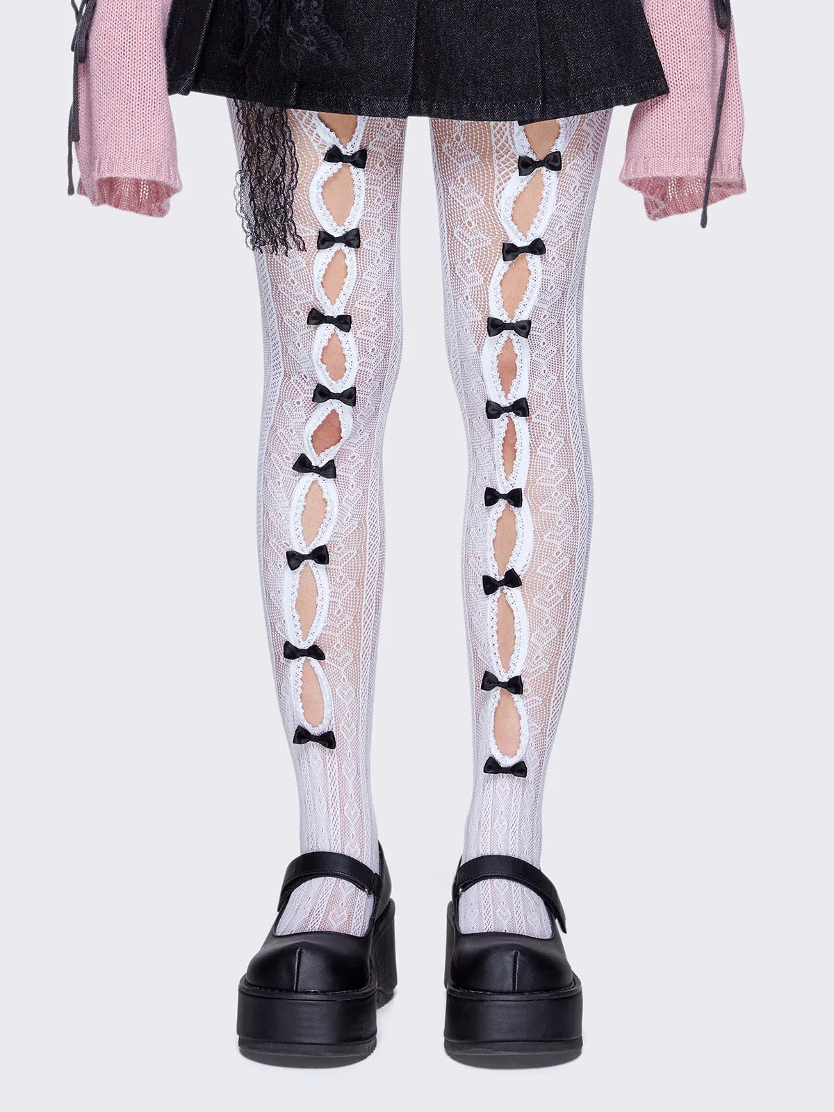 Addison Lace Cutout Bow Tights sold by Minga London
