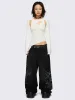 Blaze Graphic Baggy Jeans sold by Minga London