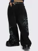 Blaze Graphic Baggy Jeans sold by Minga London