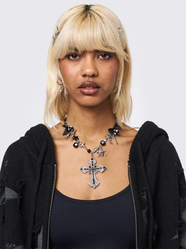 Knot of Faith Necklace sold by Minga London