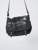 Troublemaker Black Canvas Messenger Bag sold by Minga London