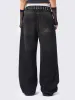 Echo Black Overdye Baggy Jeans sold by Minga London