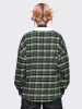 Marlon Check Polo sold by Minga London