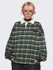 Marlon Check Polo sold by Minga London