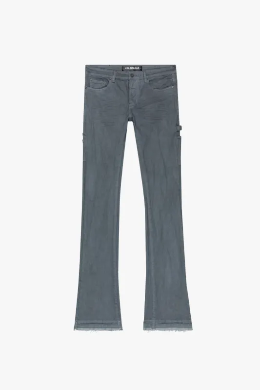 "MR. EXTENDO" GREY STACKED FLARE JEAN sold by valabasas