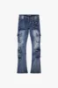 "EXPANSE” BLUE WASH STACKED FLARE JEAN sold by valabasas