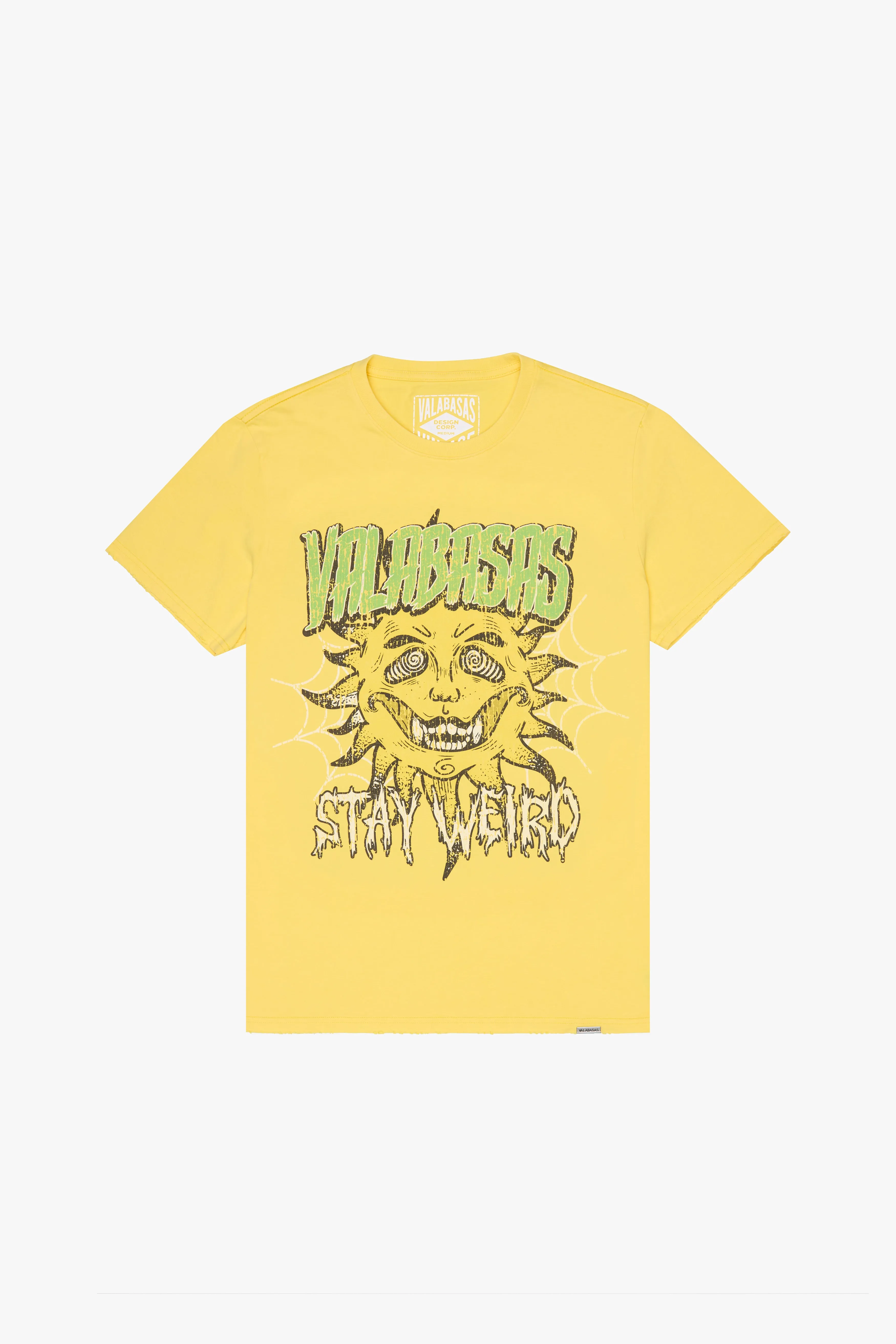 "STAY WEIRD" VINTAGE YELLOW TEE sold by valabasas