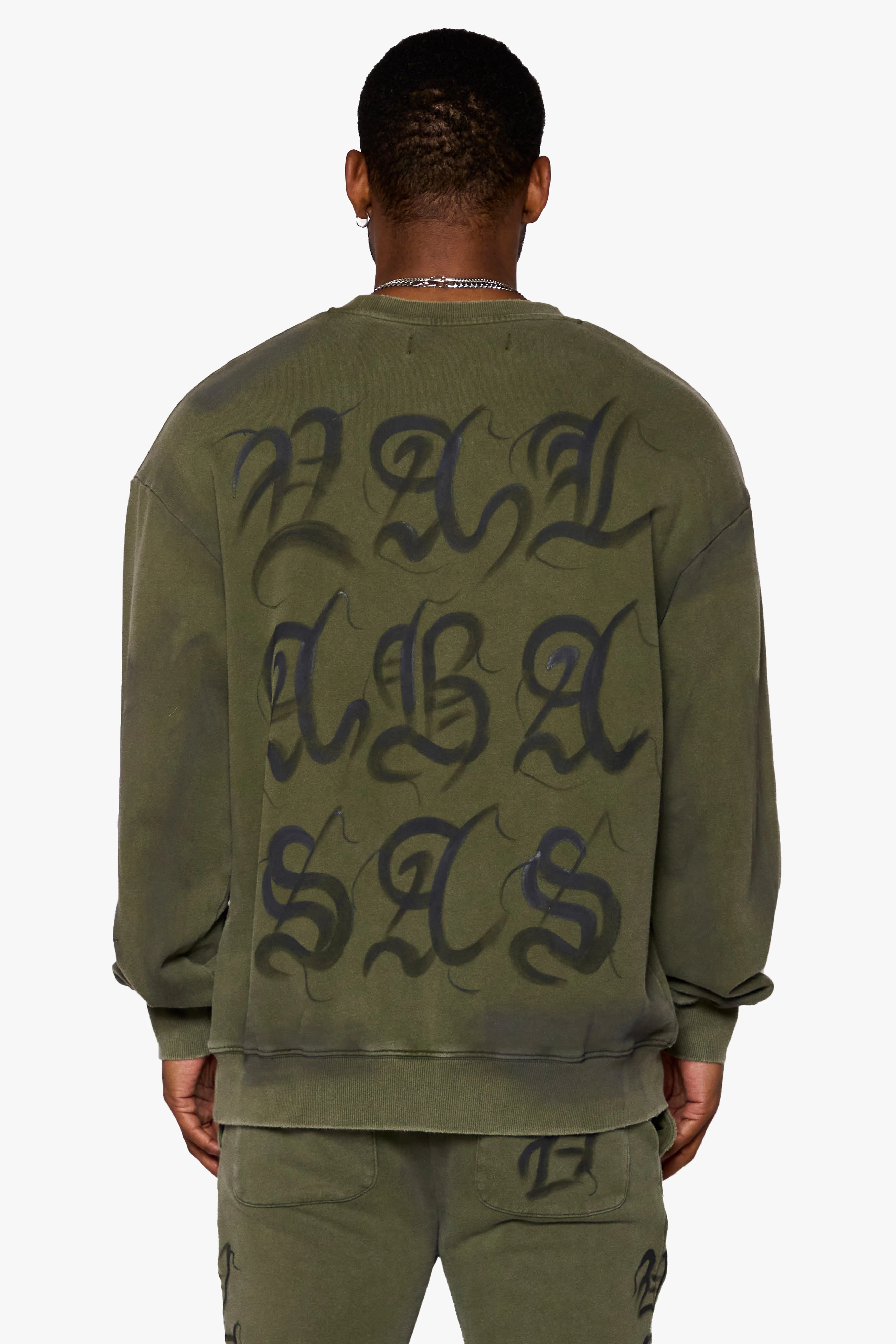 "GLYPHIQUE" LONG SLEEVE OLIVE sold by valabasas