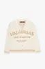 "Paradise" Cream Button Down sold by valabasas