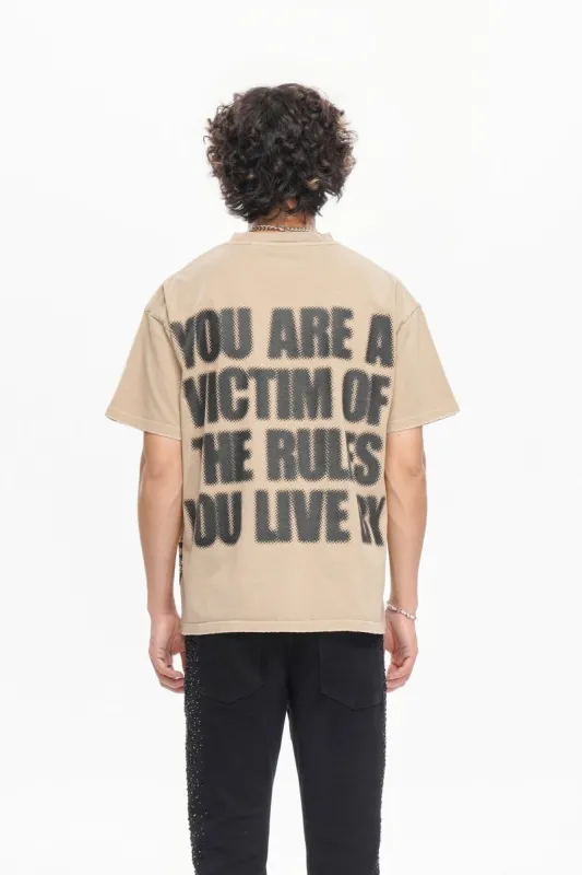 Victim Tee Khaki sold by valabasas
