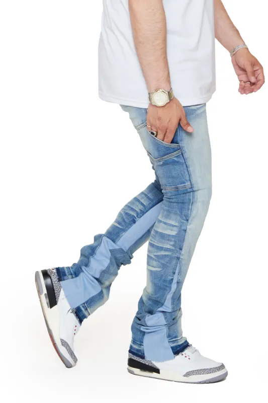 “VERTICLE” LT. BLUE WASHED STACKED FLARE JEAN sold by valabasas
