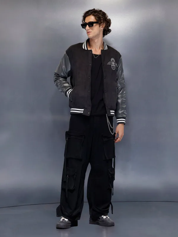 Men’s black varsity jacket with leather sleeves | Black sold by Wrogn