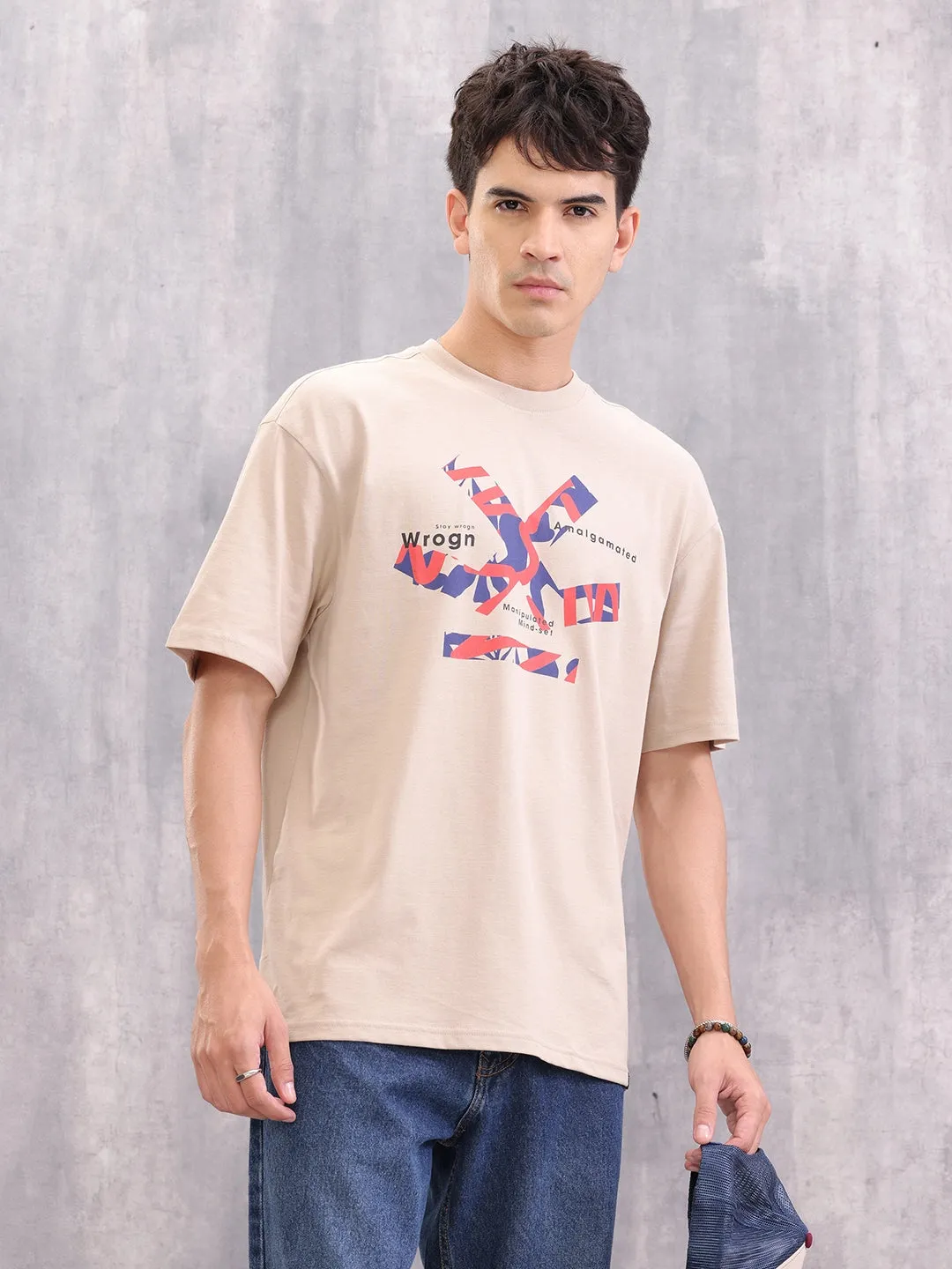 Brand Carrier Graphic Printed Oversized Fit T-Shirt | Beige sold by Wrogn