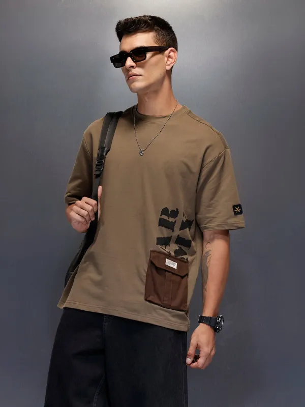 Men's contemporary oversized t-shirt with printed accent and flap pocket | Olive sold by Wrogn