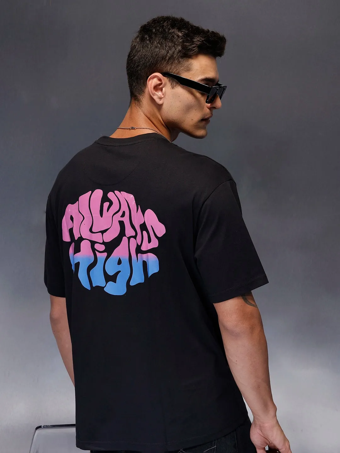 Men's oversized tee with back print | Black sold by Wrogn