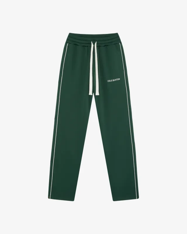 PIPED TRACK PANTS sold by Cole Buxton