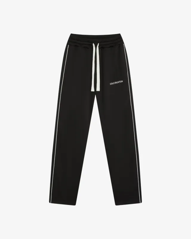 PIPED TRACK PANTS sold by Cole Buxton