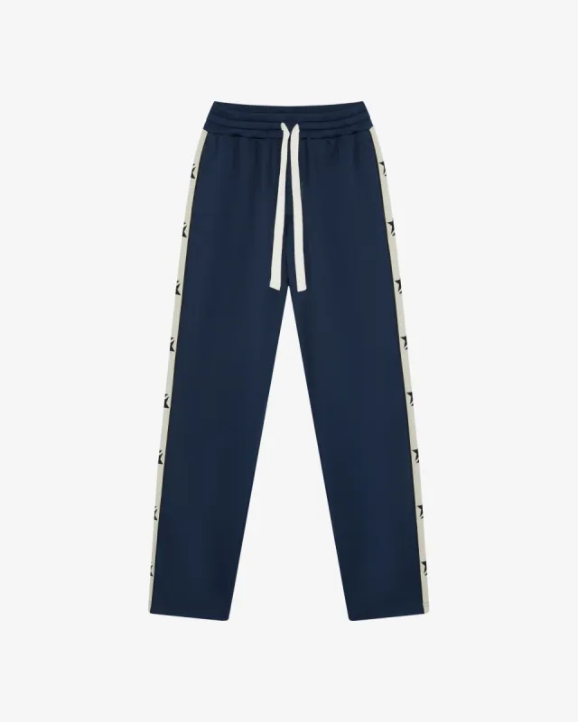 TWO STAR TAPE TRACK PANTS sold by Cole Buxton