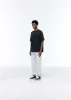 AKIMBO X CB SWEATPANTS sold by Cole Buxton