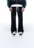 CONTRAST TAPE TRACK PANT sold by Cole Buxton