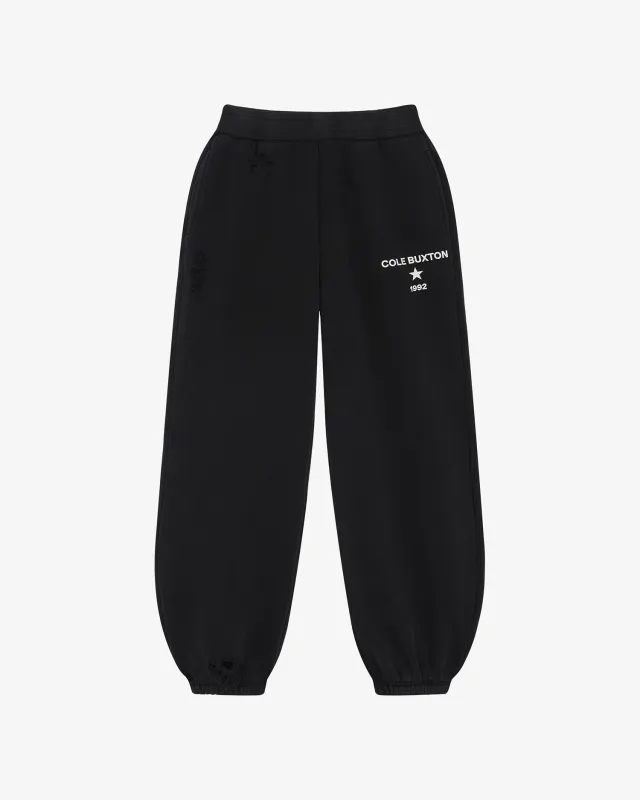 1992 DISTRESSED SWEATPANTS sold by Cole Buxton