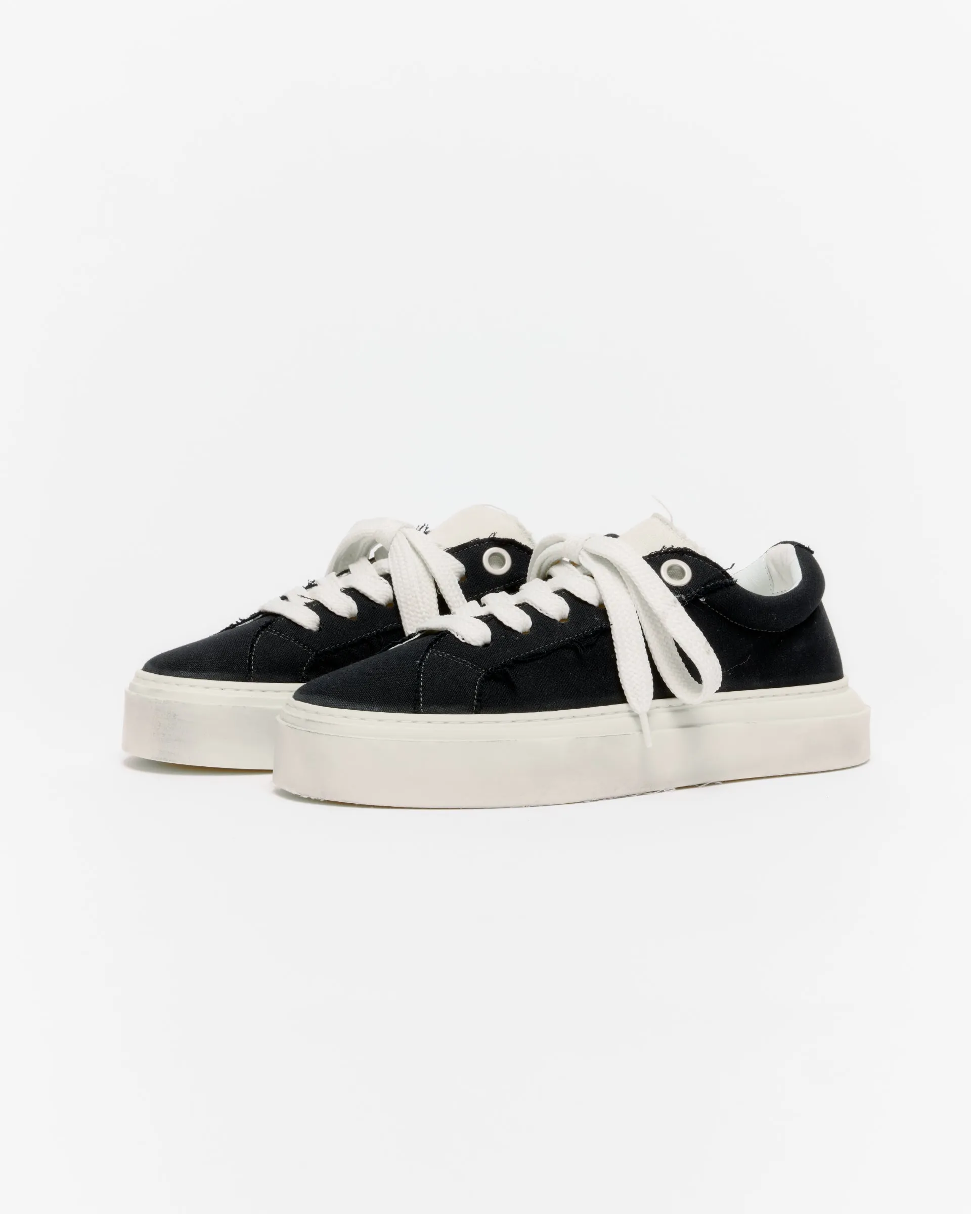 THE VINTAGE WILSON SNEAKER sold by Cole Buxton