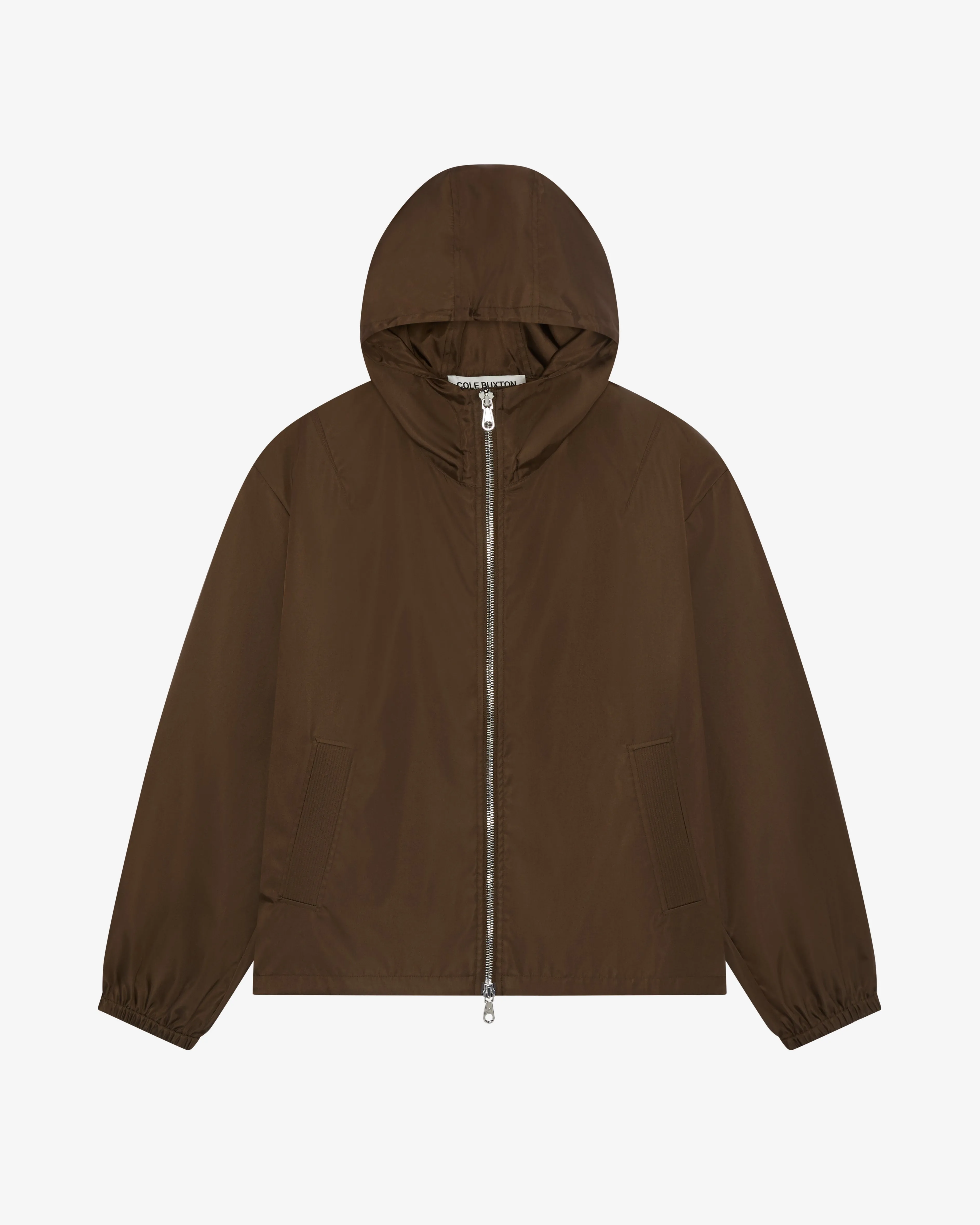 HOODED NYLON WINDBREAKER sold by Cole Buxton