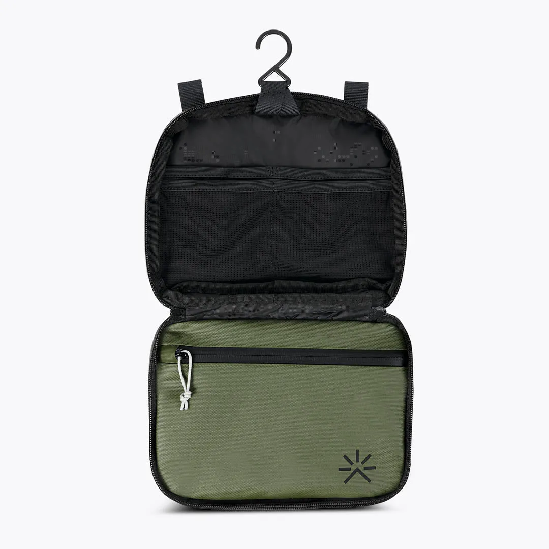 FidLock® Toiletry Cypress Green sold by Tropicfeel