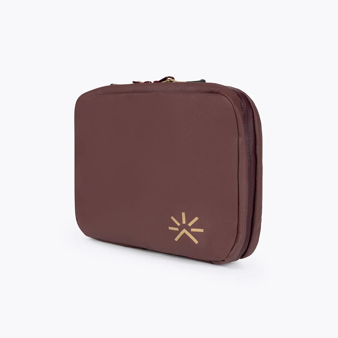 FidLock® Toiletry Chocolate Red sold by Tropicfeel
