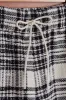 GARDEN PLAID BOUCLÉ SHORTS - BLACK sold by Portuguese Flannel
