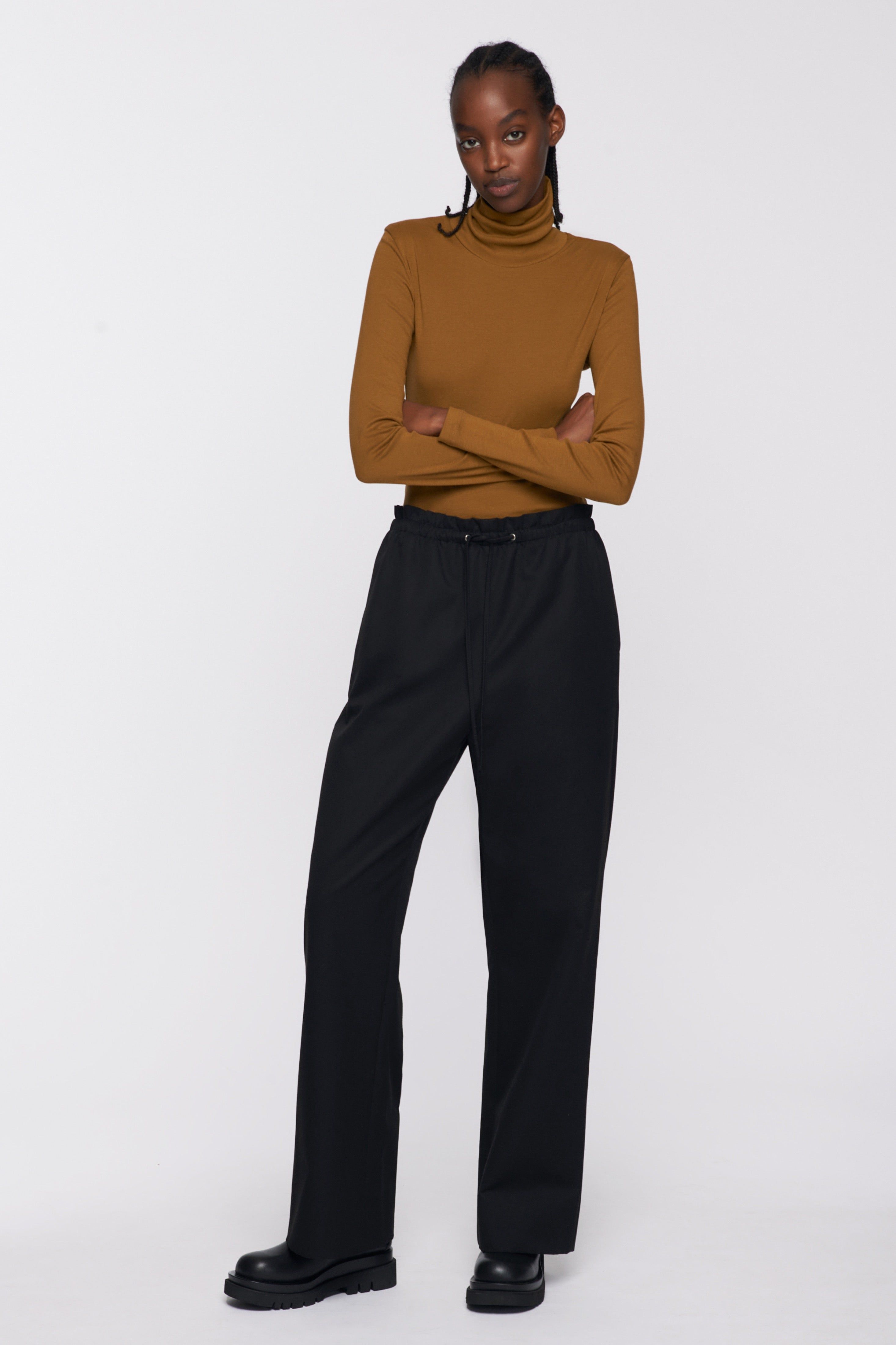 Women's Pull Up Trouser in Black sold by Kotn