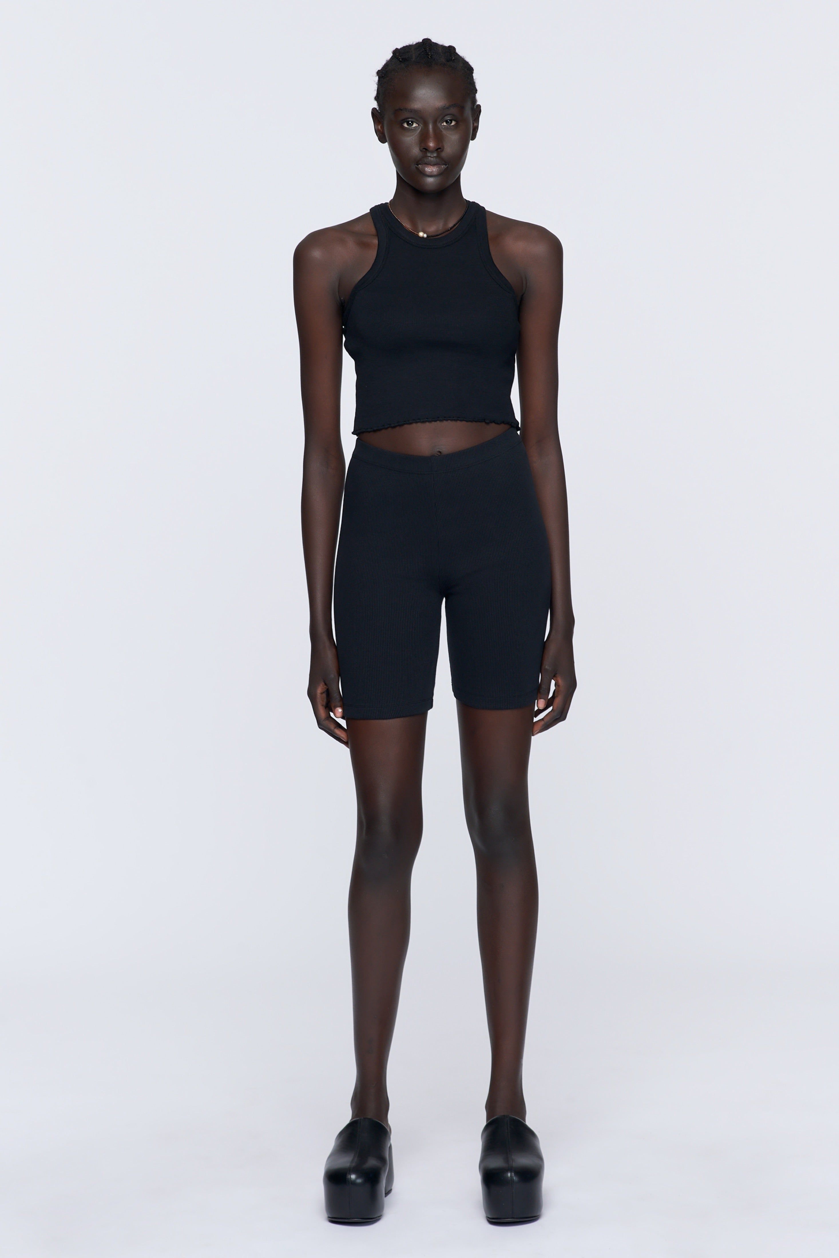 Women's Ribbed Bike Shorts in Black sold by Kotn