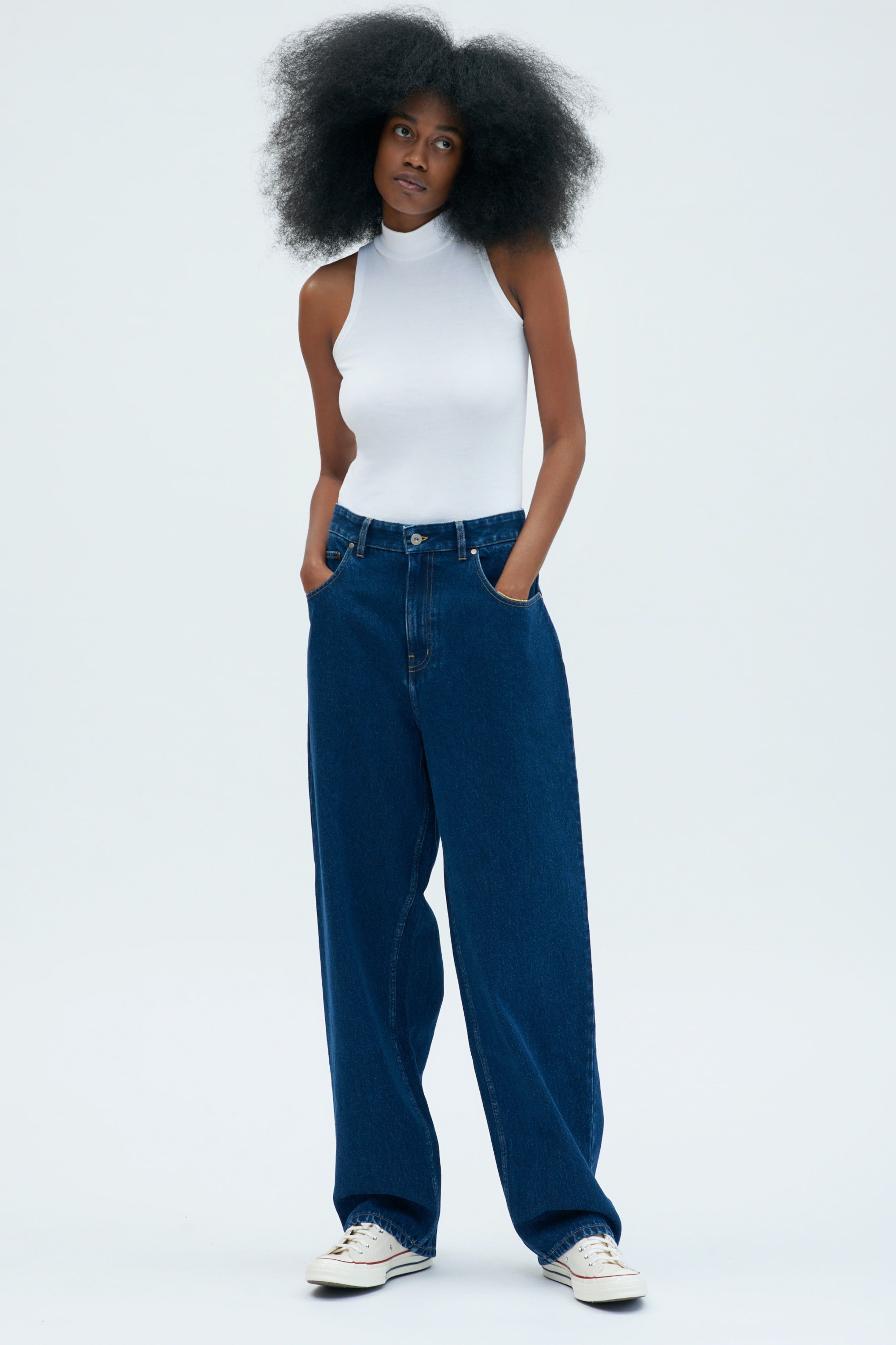 Mock Neck Tank in White sold by Kotn