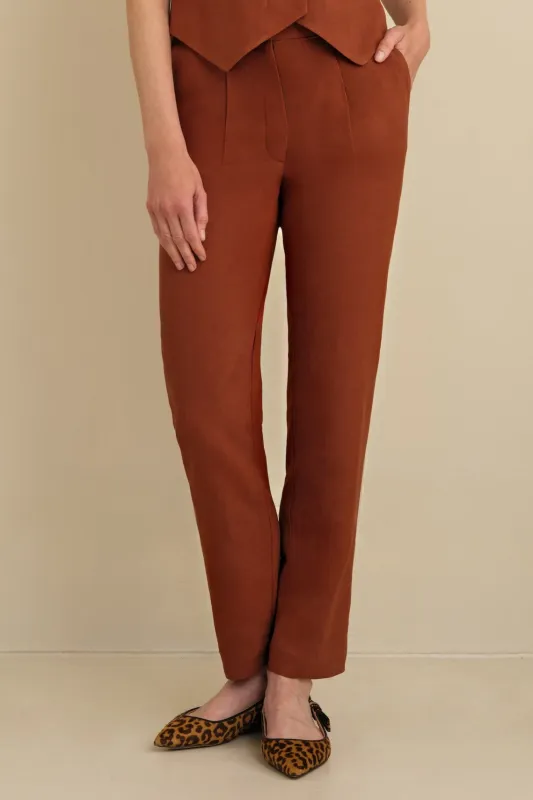 The Avery Pleated Trouser Cognac sold by Sophie Rue