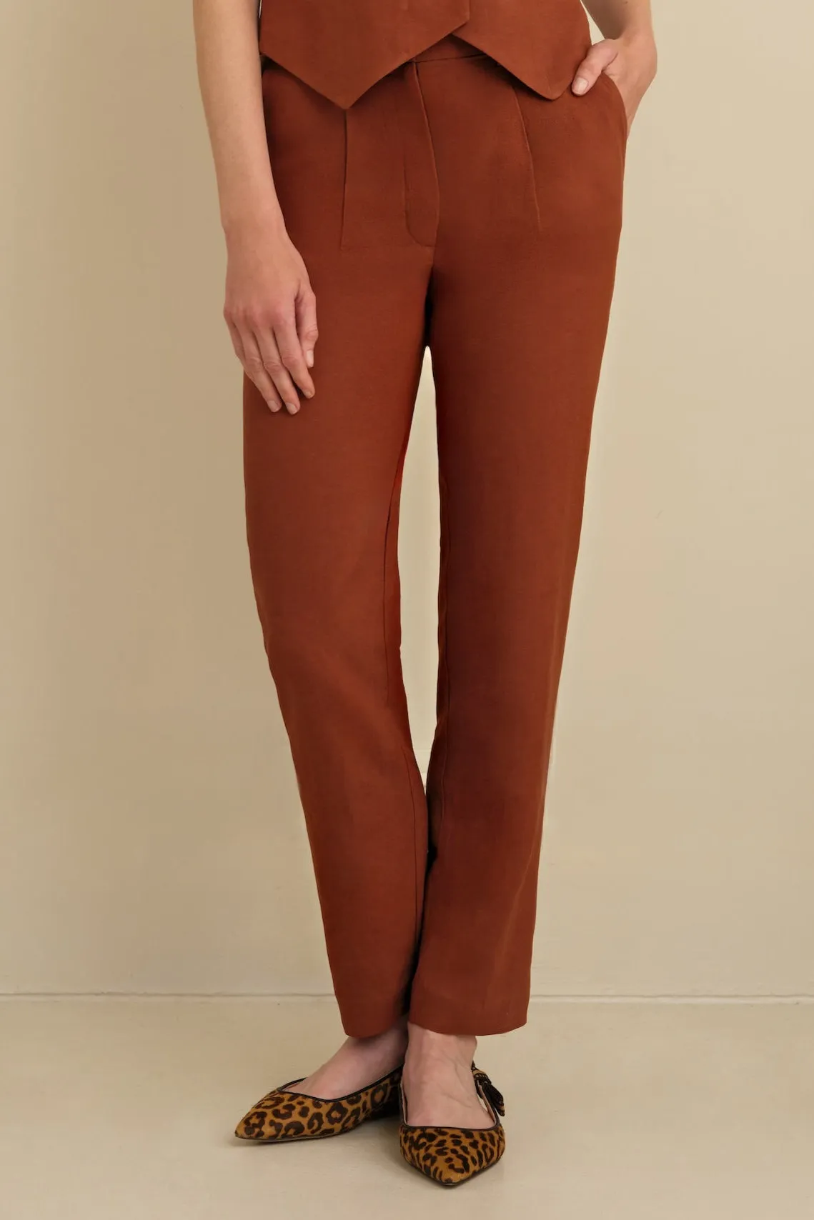 The Avery Pleated Trouser Cognac sold by Sophie Rue