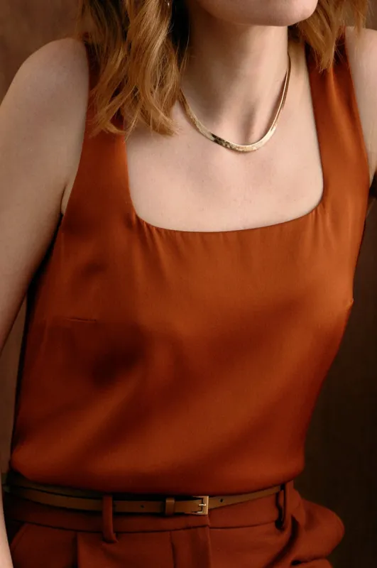 The Ivy Silk Tank Ochre sold by Sophie Rue