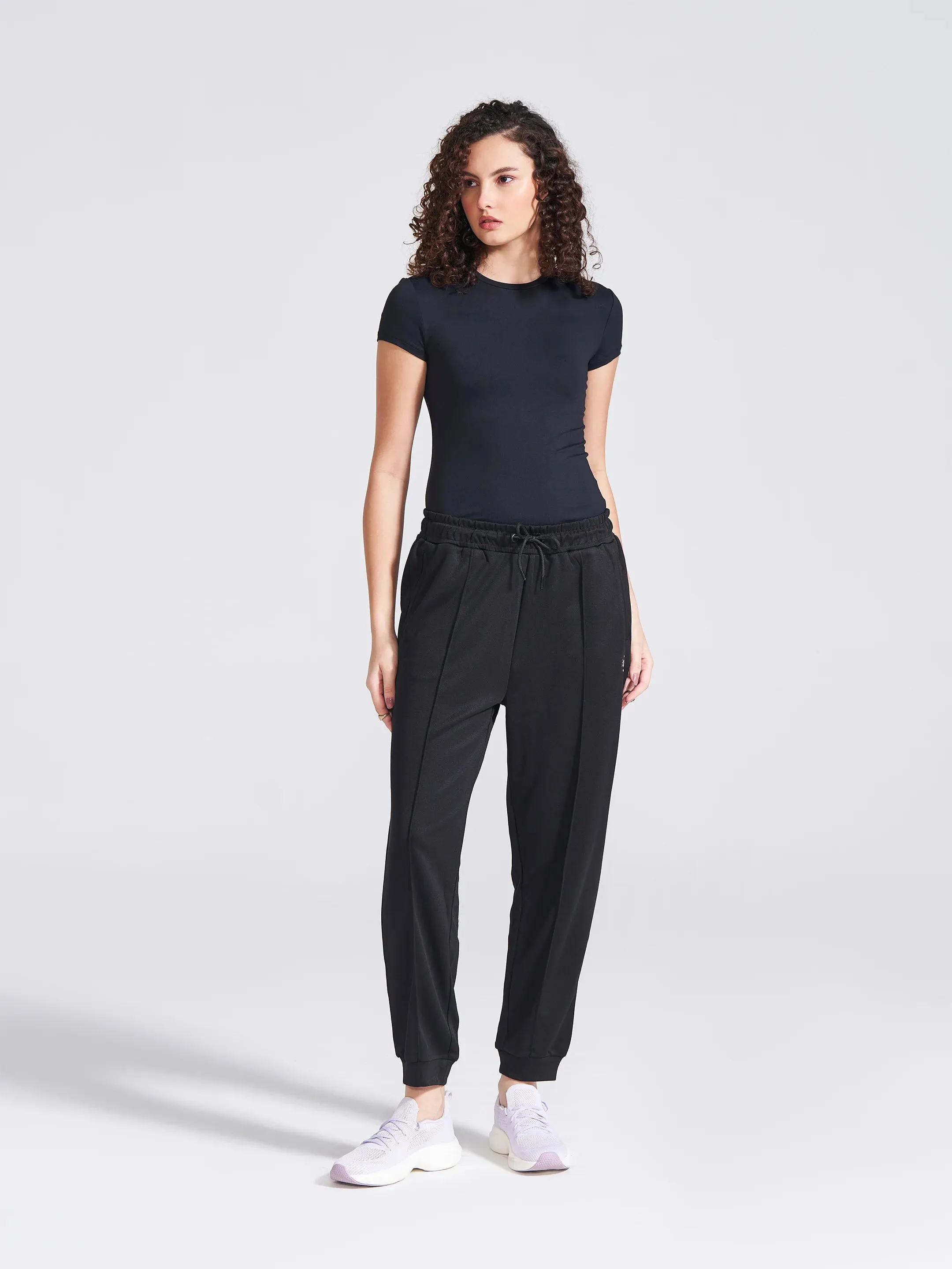 Women's Black Regular Fit Track Pants sold by Campus Shoes product image thumbnail 5