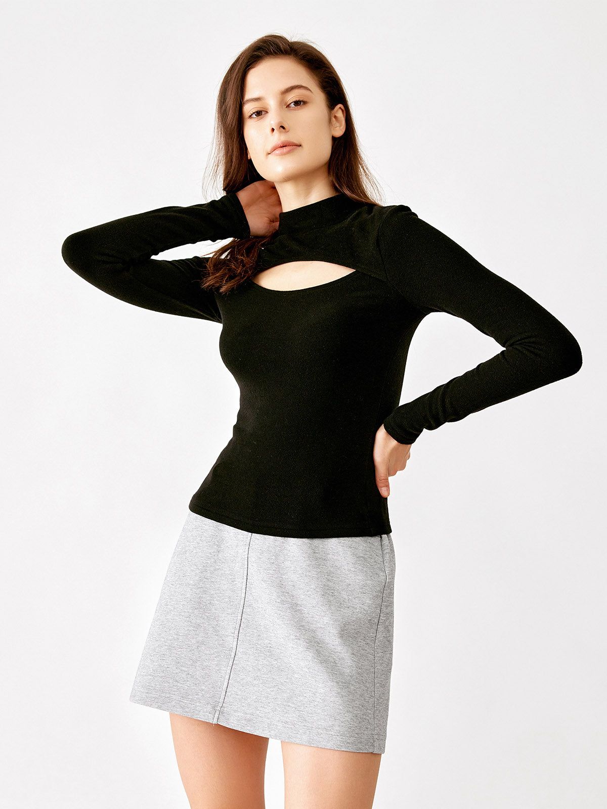 Eco-Mousse® Turtleneck Knitted Cut-out Top sold by ogl move