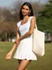Pleated Mini Skort sold by ogl move