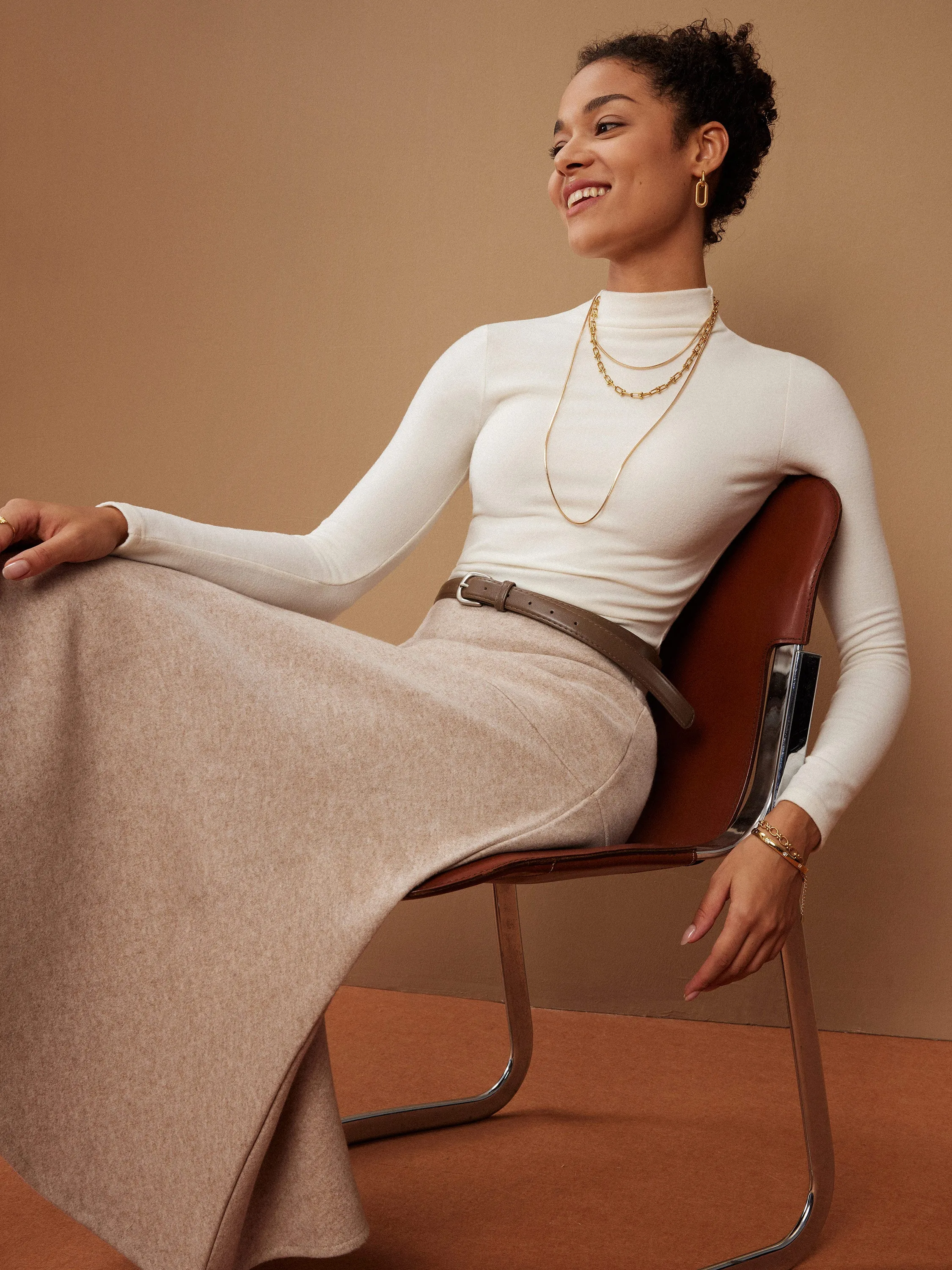 2Pcs Set Ruched Sides Tuckable Mockneck Top & Flared Maxi Skirt sold by OGLmove