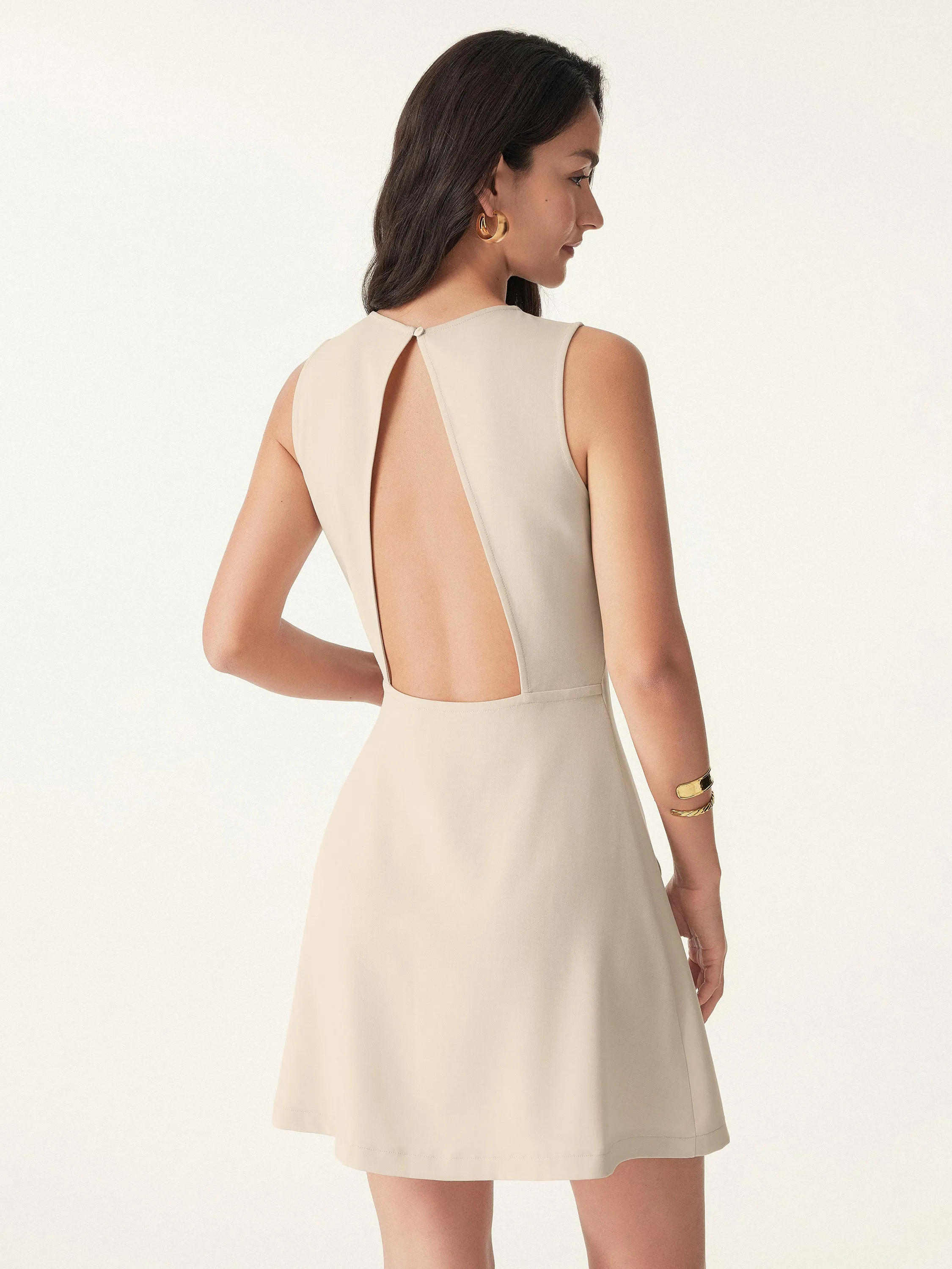 Wrinkle-Free Open-back Mini Dress with Pockets sold by ogl move