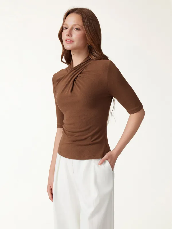 Crisscross Mock Neck Elbow Sleeve Ruched Top made by OGLmove
