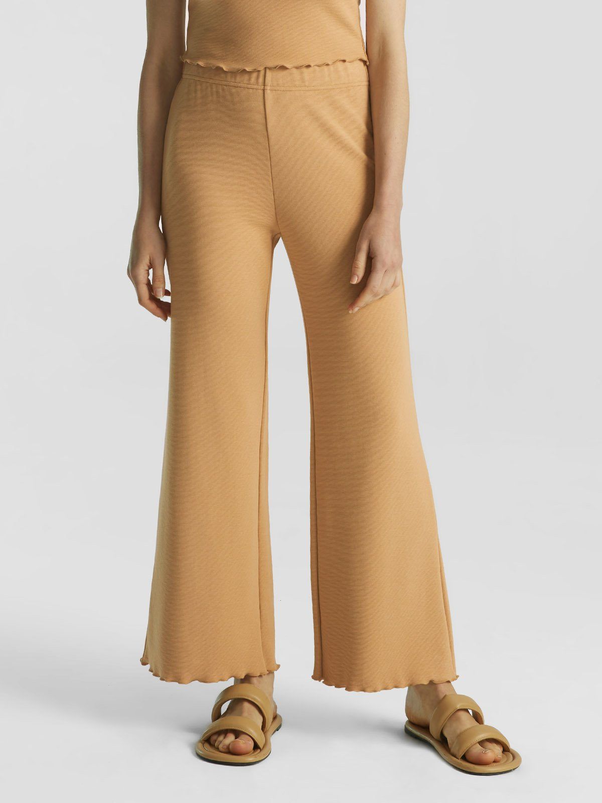 Lettuce-Hem Boot-Cut Knit Pants sold by ogl move