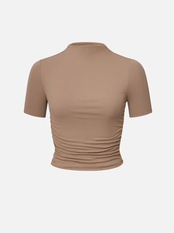 Eco-SkinKiss® Ruched Sides Mock Neck Short Sleeve Top sold by ogl move
