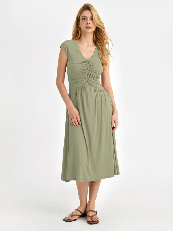Eco-SkinKiss® Ruched V-Neck Midi Dress sold by ogl move