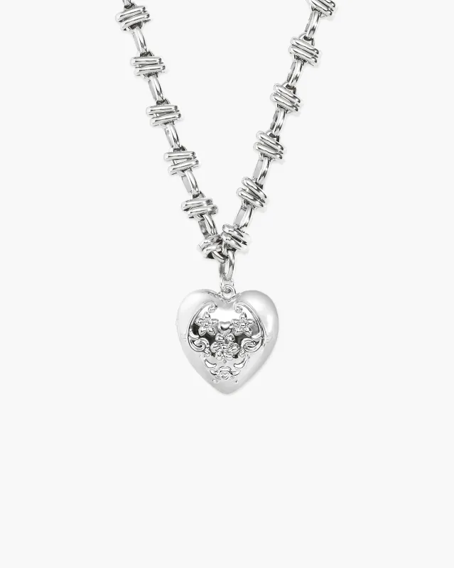 Secret Keeps Openable Heart Necklace in Silver made by En Route Jewelry