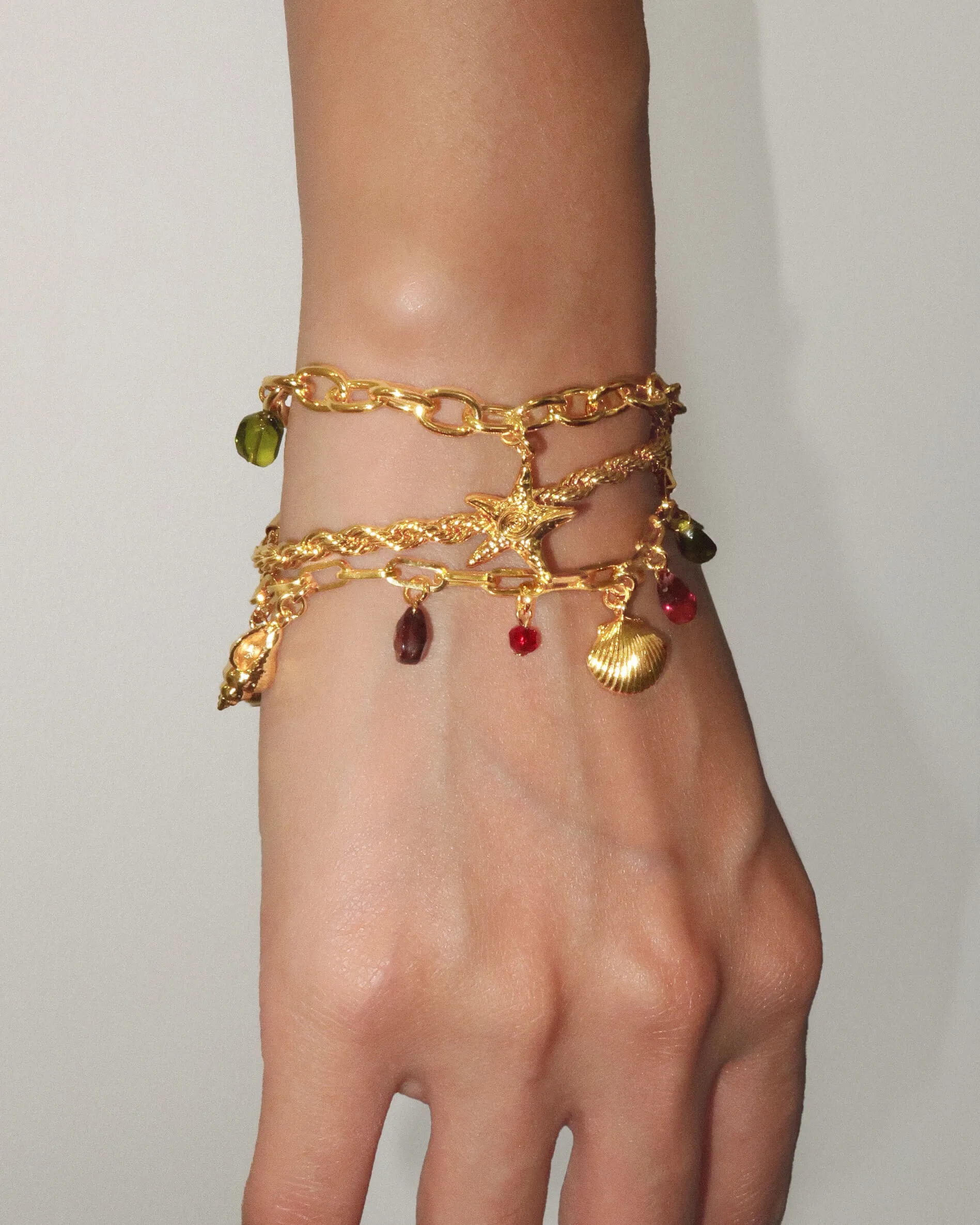 Coral Dancer Charm Bracelet sold by En Route Jewelry product image thumbnail 2