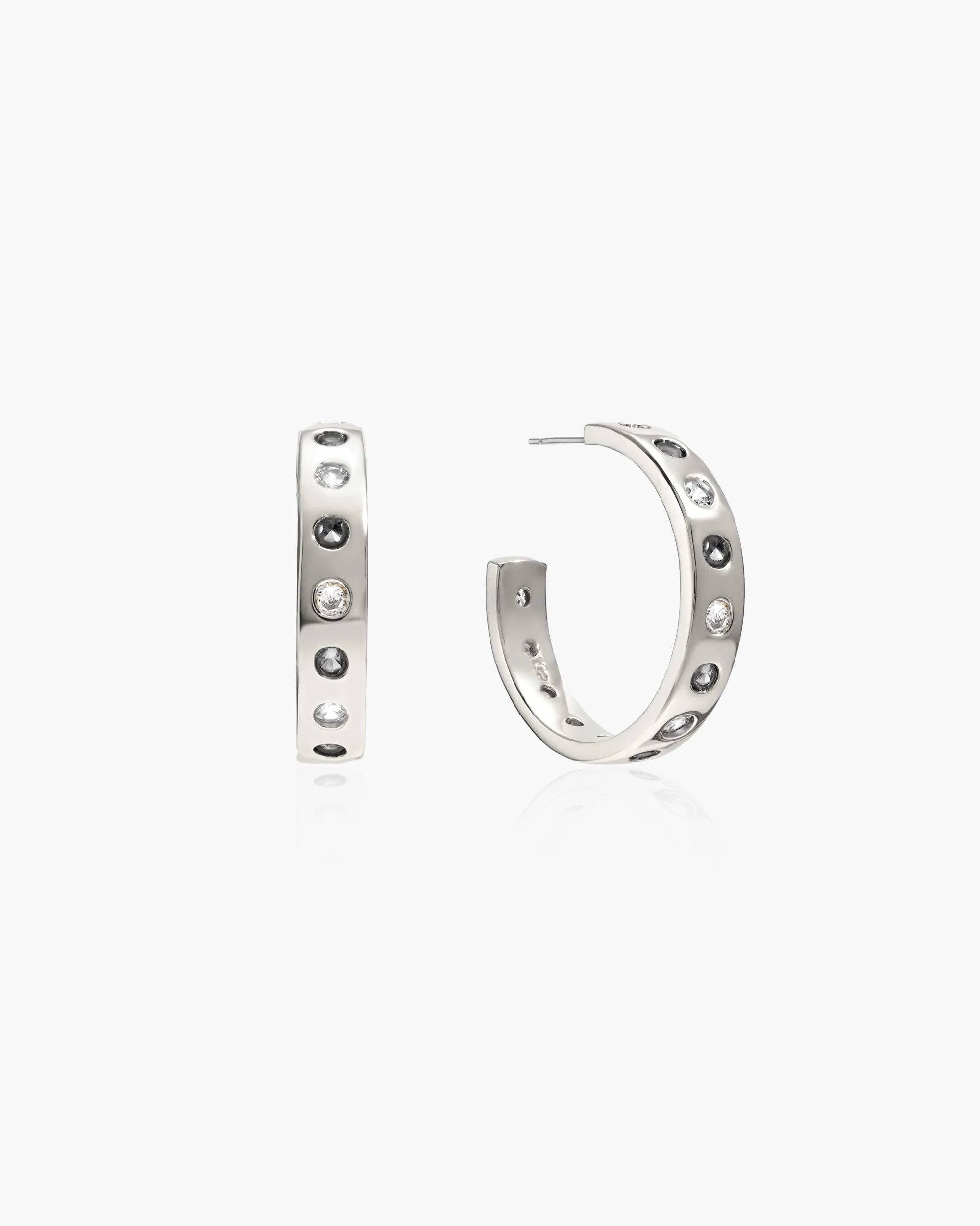 Dustlight Earrings in Silver sold by en route
