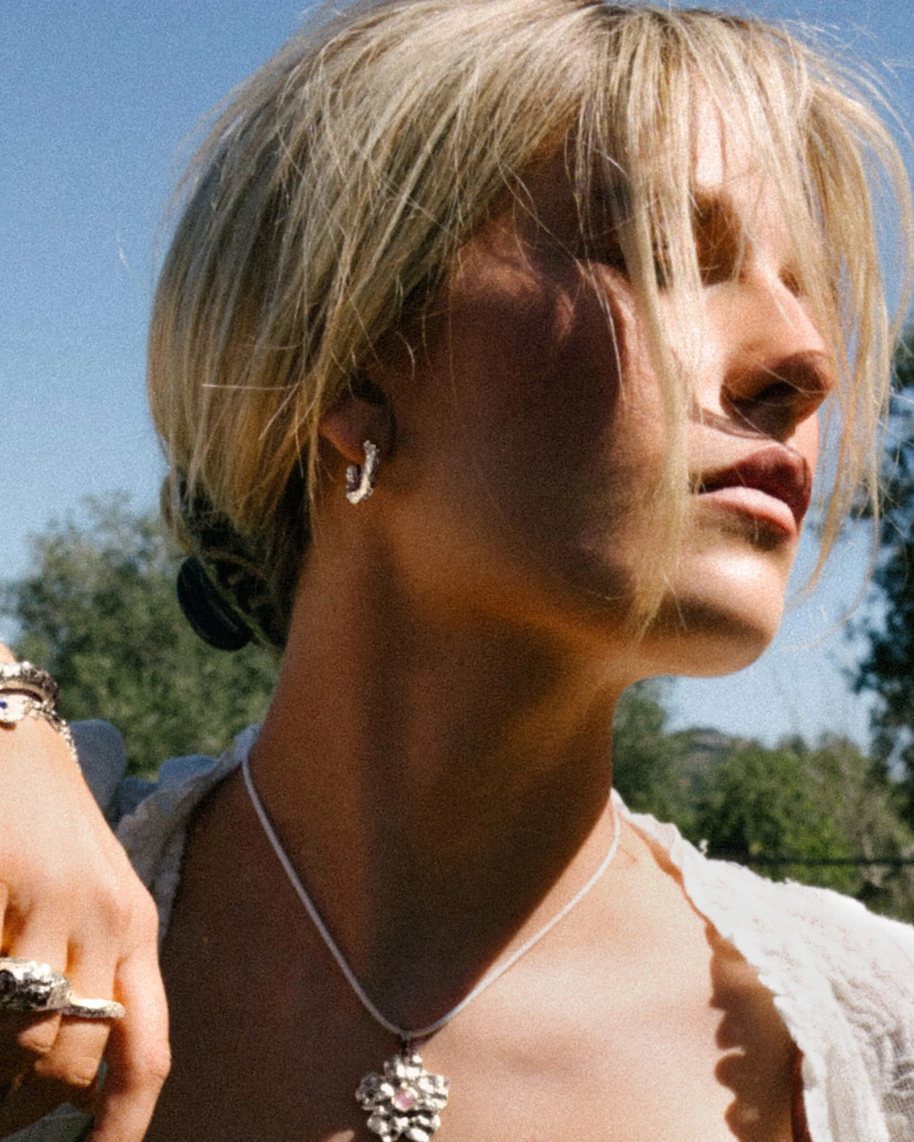 Jenny Medium Hoop Earrings in Silver sold by En Route Jewelry product image thumbnail 4