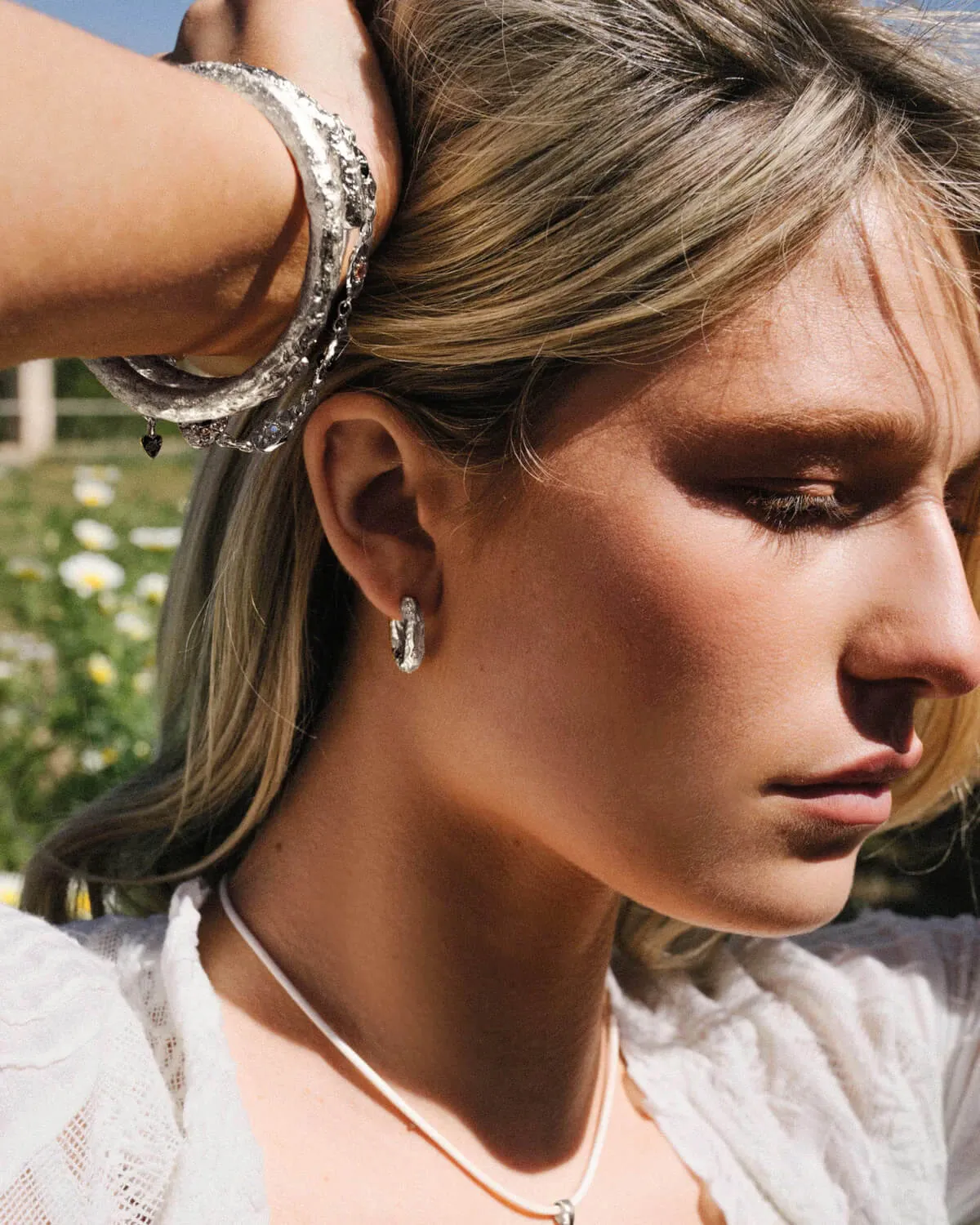 Jenny Medium Hoop Earrings in Silver sold by En Route Jewelry product image thumbnail 2